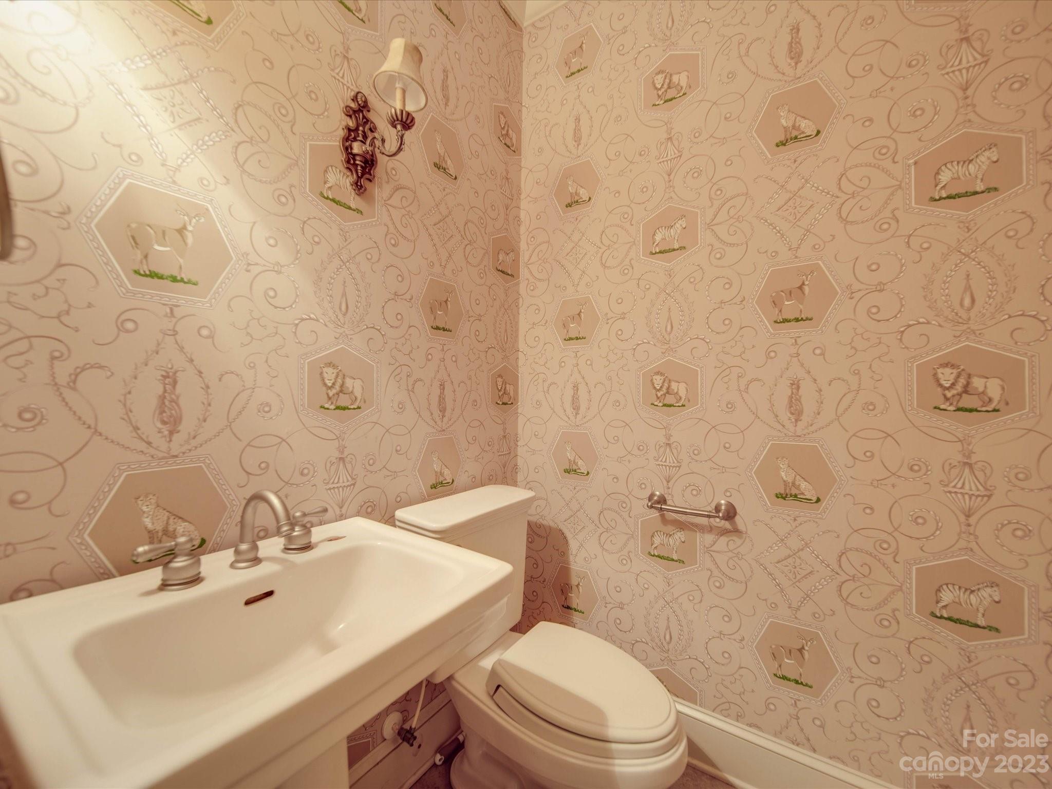 1939 Neel Road Salisbury, NC 28147 - Photo 41 of 48 a bathroom with a sink a toilet and shower