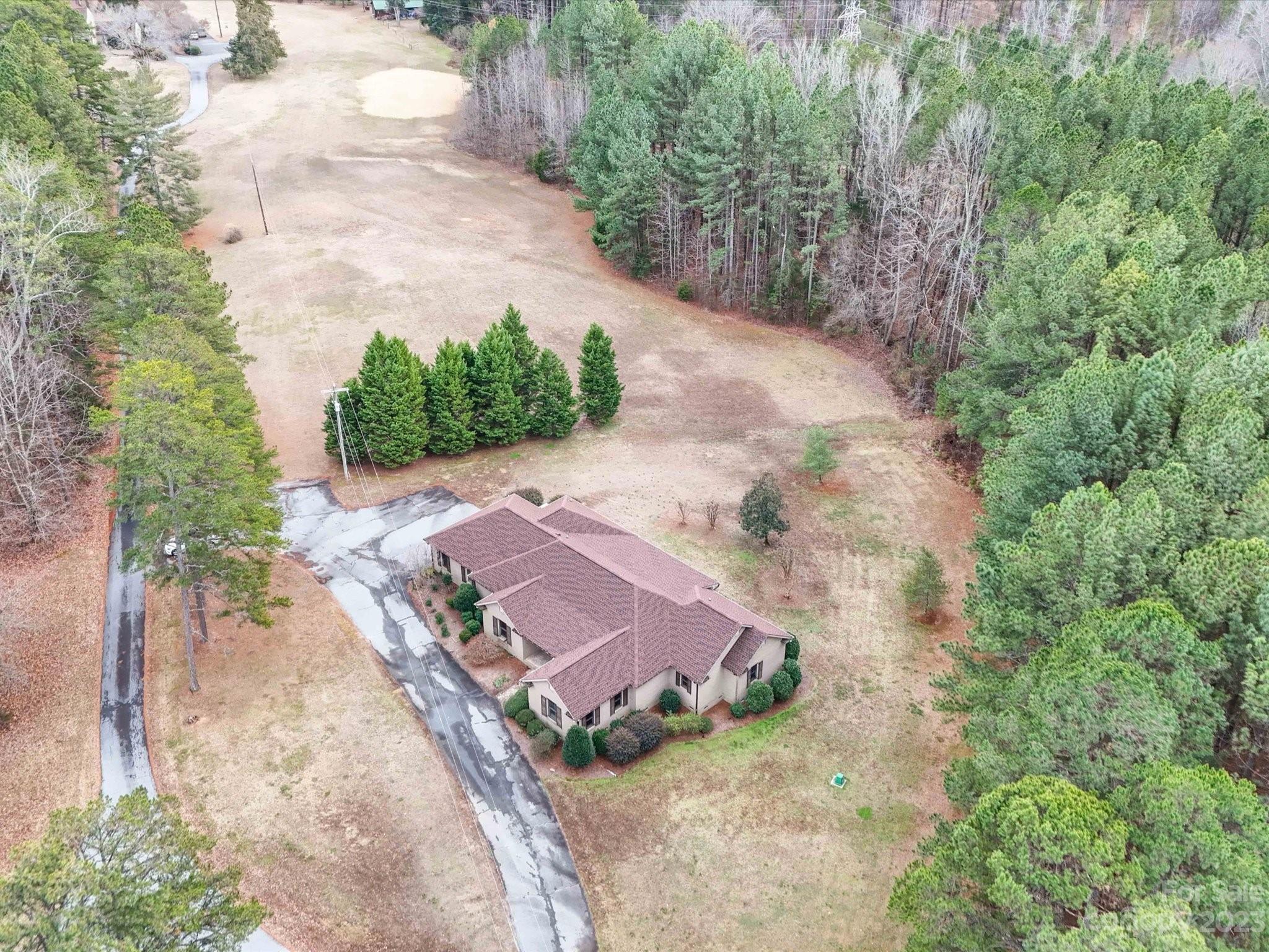 1939 Neel Road Salisbury, NC 28147 - Photo 6 of 48 an aerial view of a house with a yard