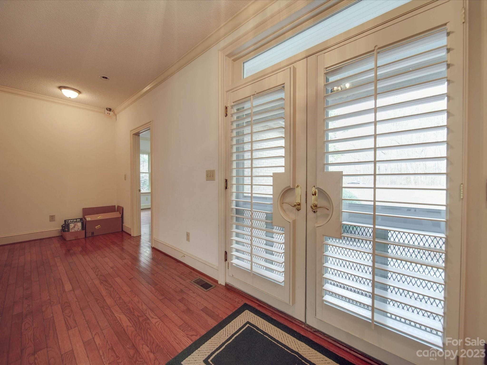 1939 Neel Road Salisbury, NC 28147 - Photo 9 of 48 a view of empty room with wooden floor and fan