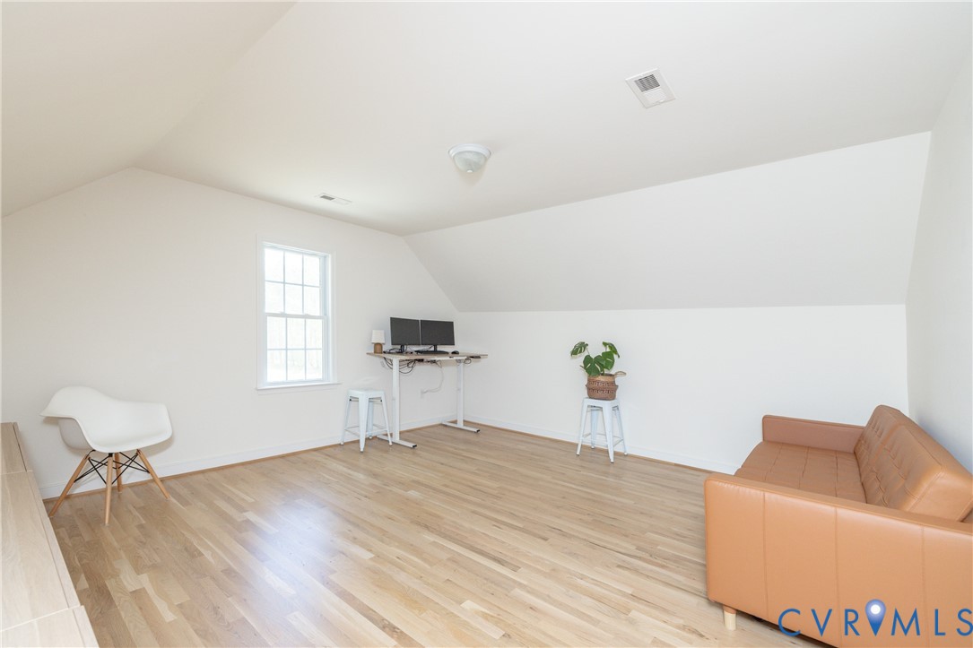 15618 Rowlett Road Chesterfield, VA 23838 - Photo 18 of 29 a living room with furniture and a window