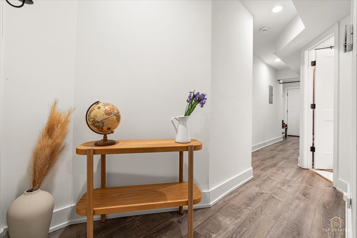 3432 West Belden Avenue, Unit G Chicago, IL 60647 - Photo 18 of 32 a view of room with furniture and wooden floor