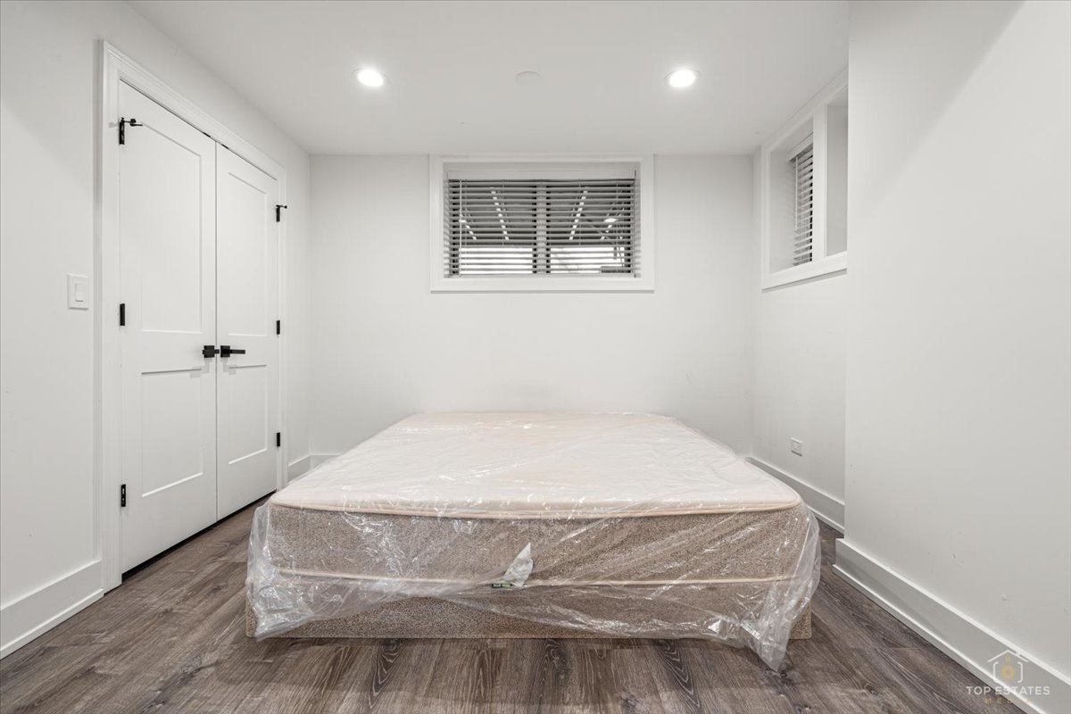 3432 West Belden Avenue, Unit G Chicago, IL 60647 - Photo 21 of 32 a bedroom with a bed and a window
