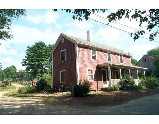 29 North Sullivan Road Charlton, MA 01507 - Photo 2 of 6 a front view of a house with a yard