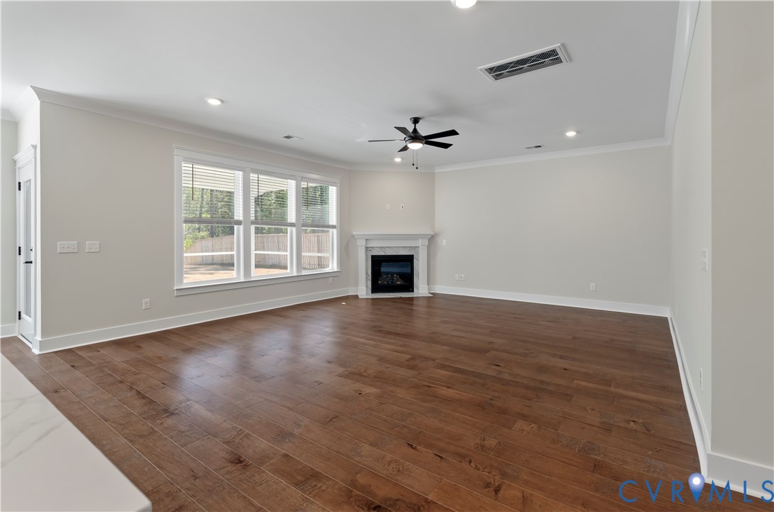 3708 Rocketts Rdg Drive Goochland, VA 23063 - Photo 12 of 29 wooden floor in an empty room with a window