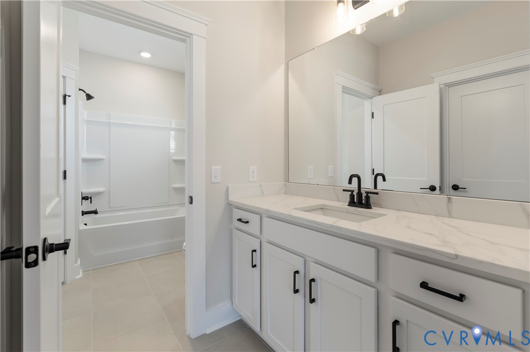 3708 Rocketts Rdg Drive Goochland, VA 23063 - Photo 22 of 29 a bathroom with a tub sink and mirror