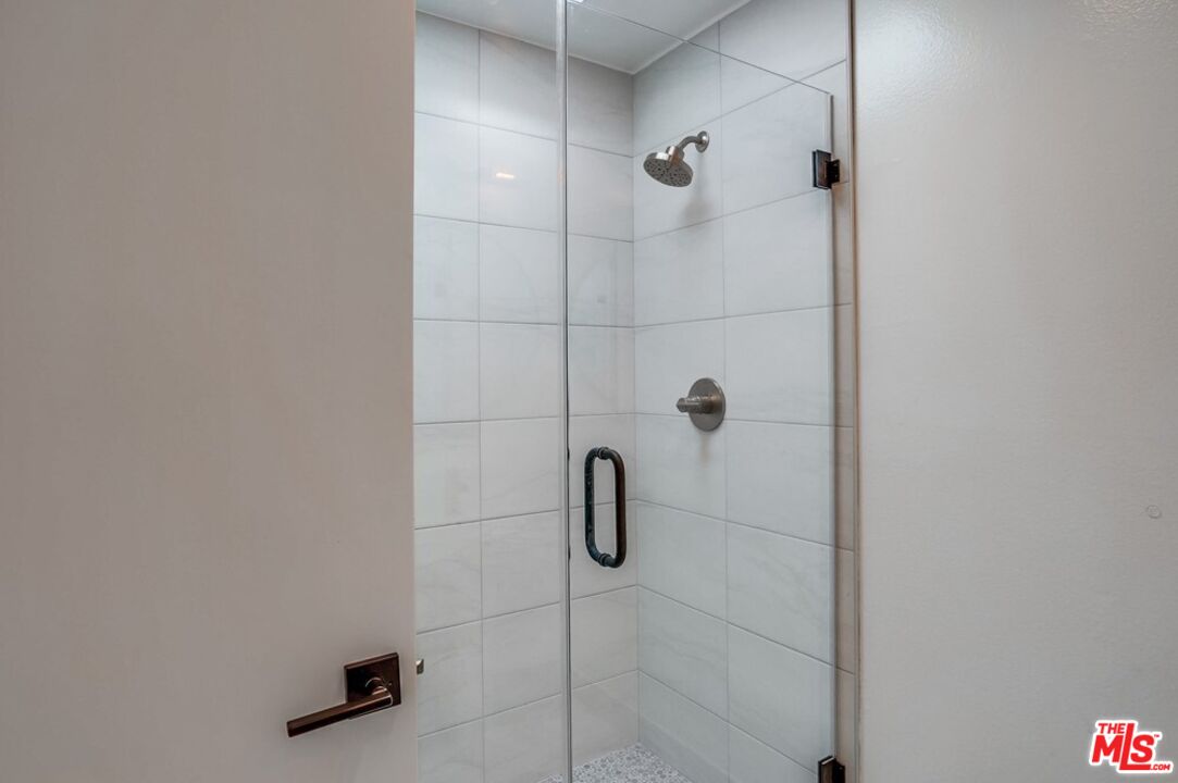 18241 Coastline Drive, Unit 2 Malibu, CA 90265 - Photo 23 of 45 a bathroom with a shower