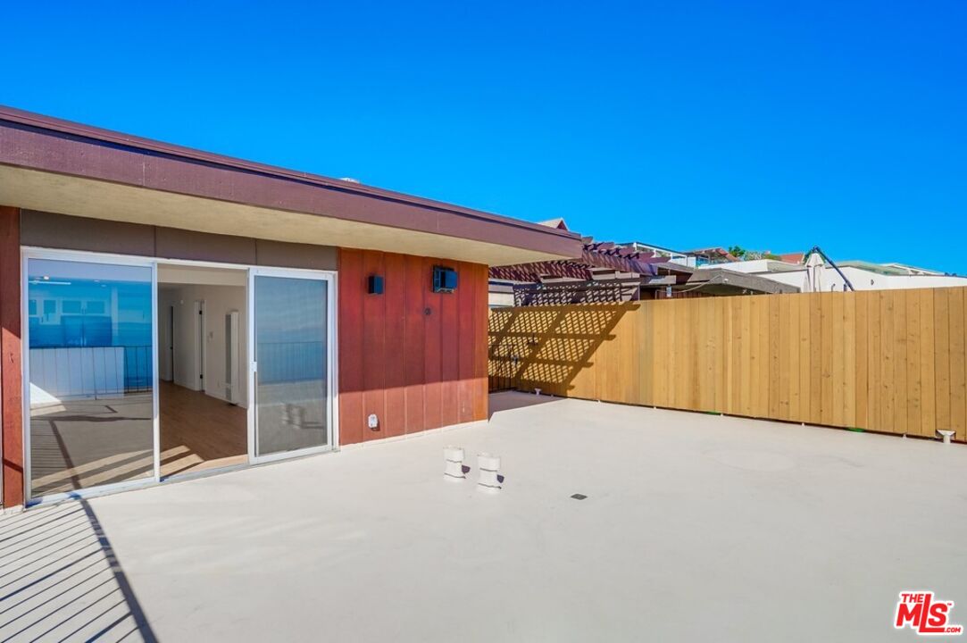 18241 Coastline Drive, Unit 2 Malibu, CA 90265 - Photo 36 of 45 a view of a backyard