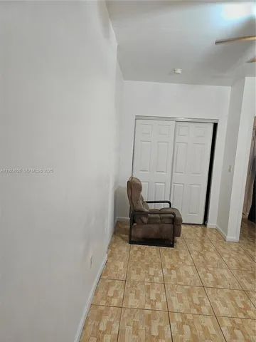 a hallway with a couch