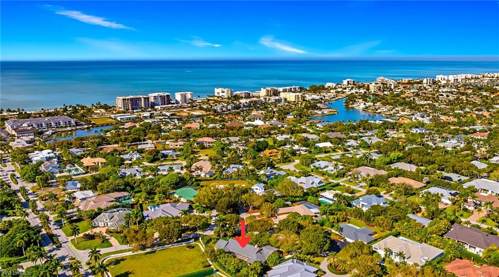 586 Yucca Road Naples, FL 34102 - Photo 24 of 26 View of property location with a large body of water and nearby suburban area