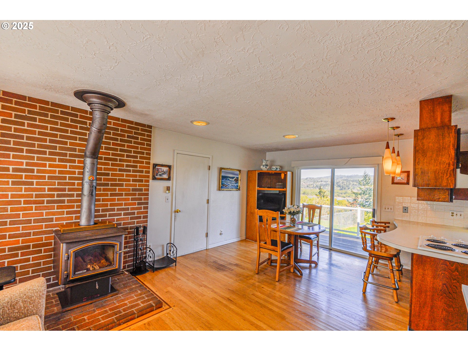 72164 Little Jack Falls Road Rainier, OR 97048 - Photo 12 of 48 a living room with furniture and wooden floor