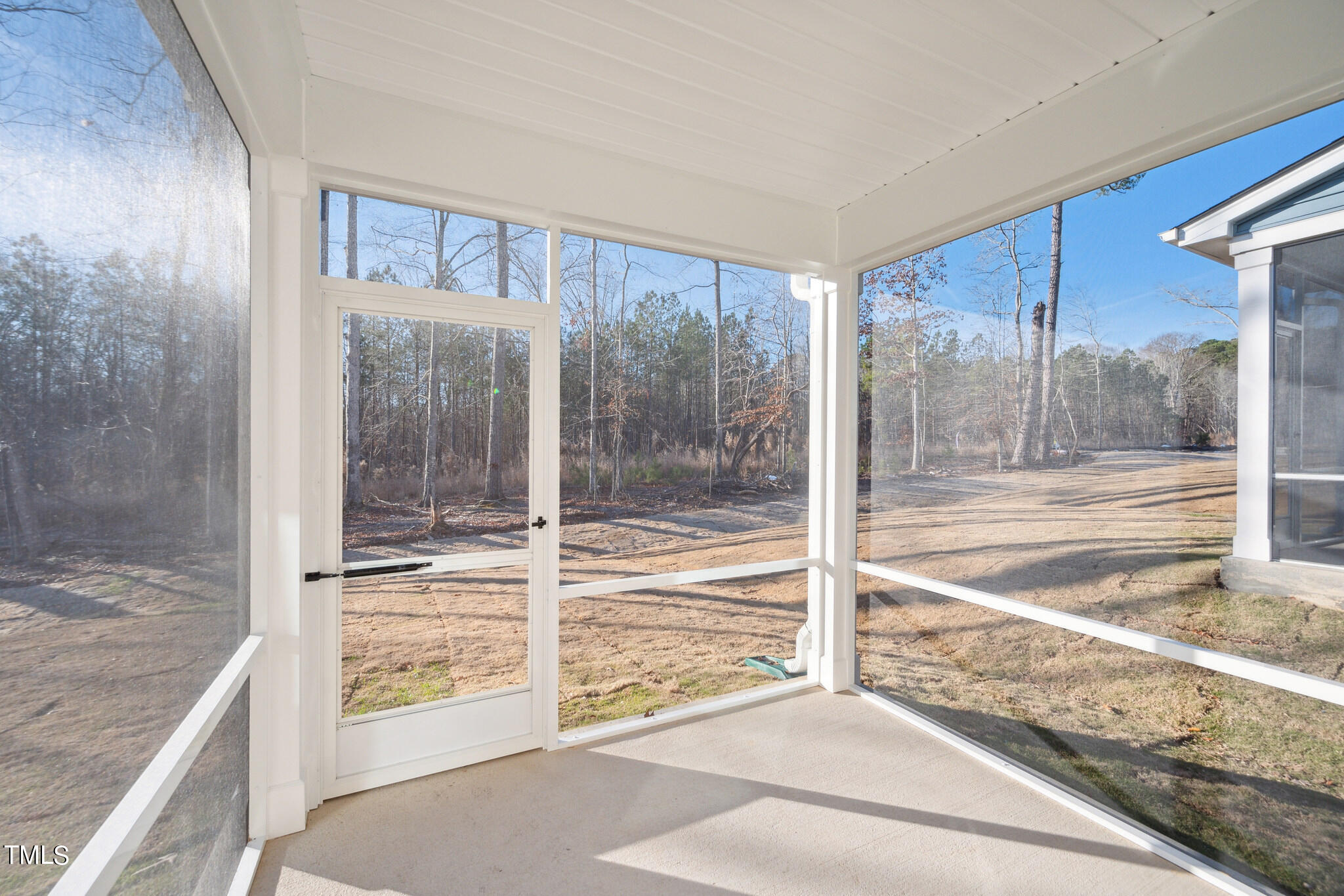 429 Lily Grv Loop Raleigh, NC 27610 - Photo 29 of 31 a view of a room with a door and balcony