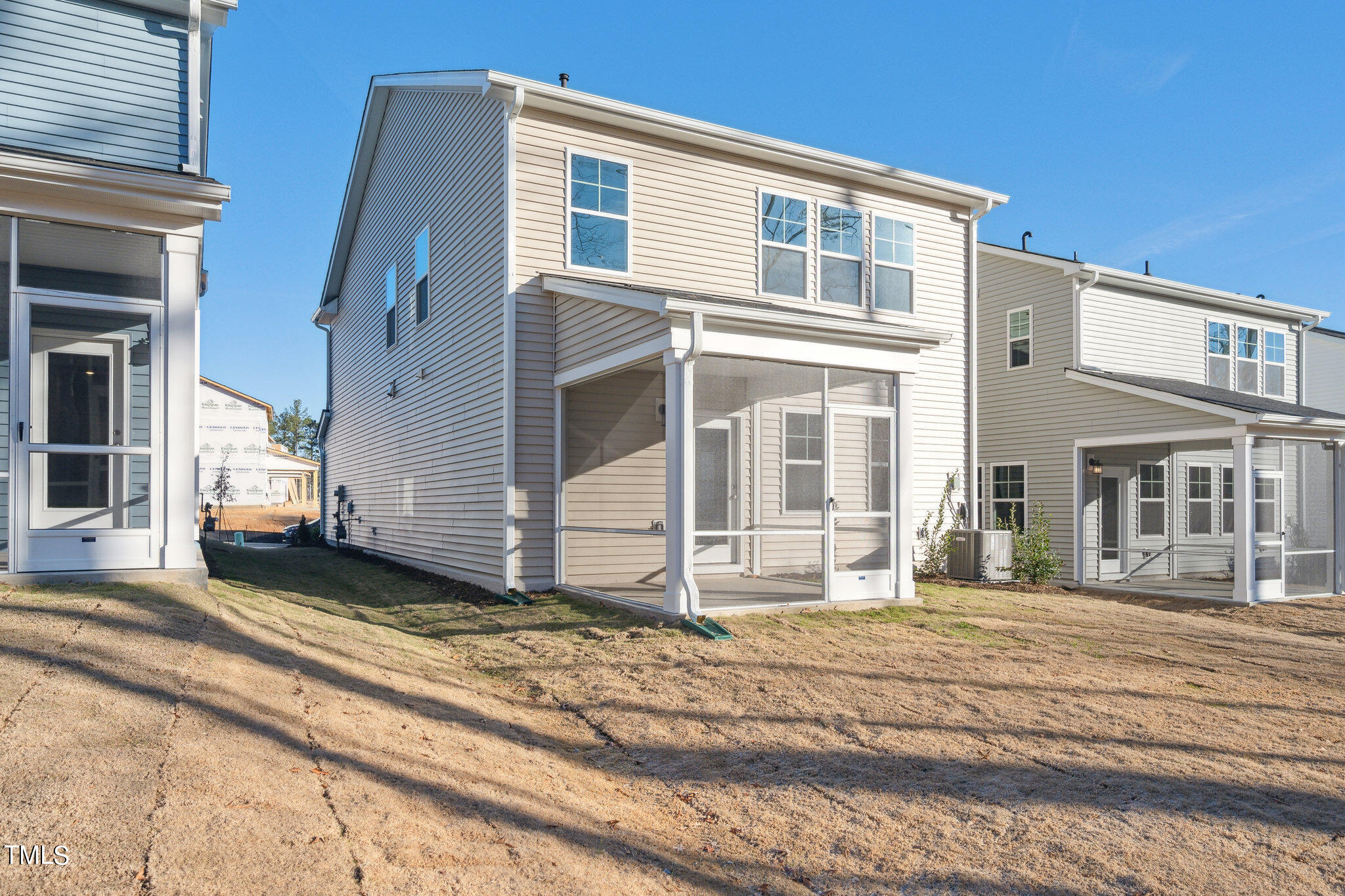 429 Lily Grv Loop Raleigh, NC 27610 - Photo 31 of 31 a view of a house with a house in the background