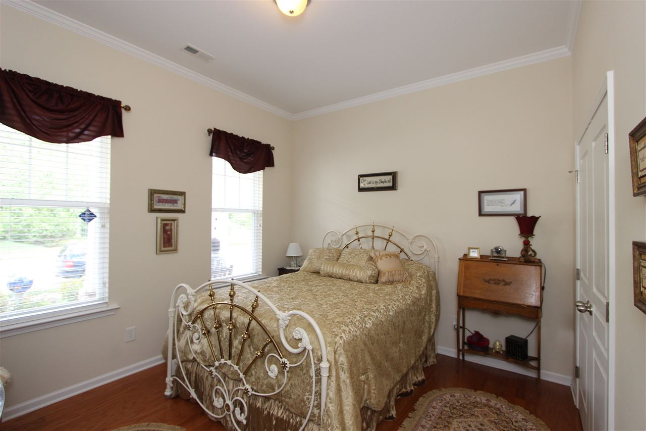 3402 Ranbir Drive Durham, NC 27713 - Photo 14 of 24 Front Bedroom First Floor, Hardwood Floors , 10' Ft Ceilings, Crown Molding Bedroom 2
