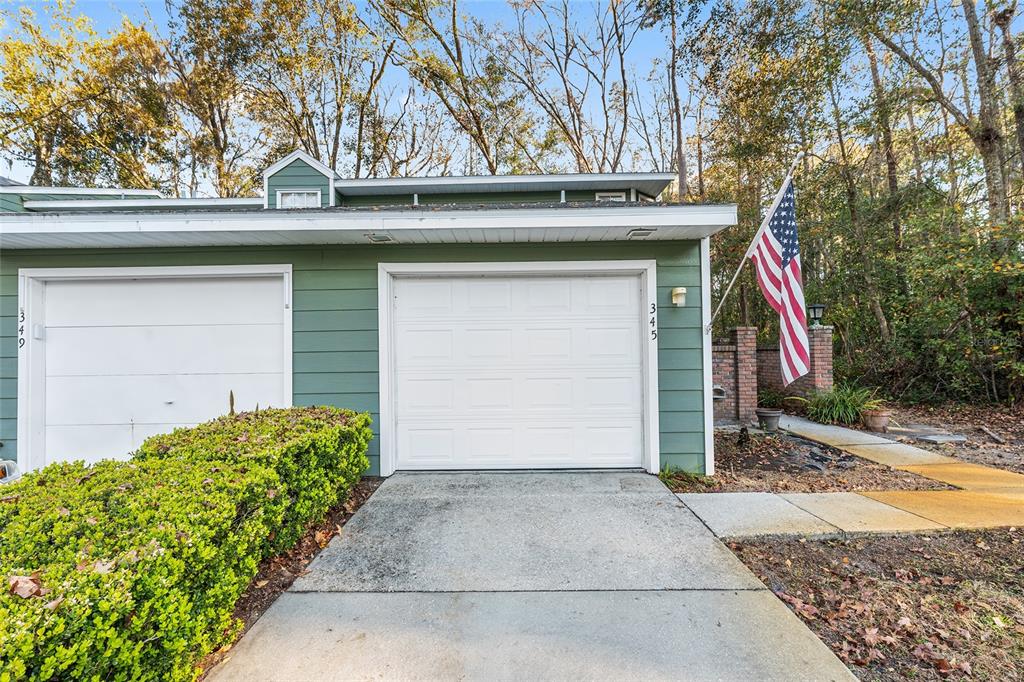 345 Northwest 48th Boulevard, Unit K Gainesville, FL 32607 - Photo 4 of 50 a view of outdoor space and garden