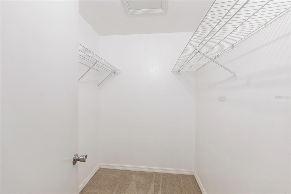 345 Northwest 48th Boulevard, Unit K Gainesville, FL 32607 - Photo 41 of 50 a view of a room with racks on the wall