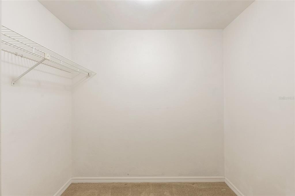 345 Northwest 48th Boulevard, Unit K Gainesville, FL 32607 - Photo 42 of 50 a view of small space with racks on the wall