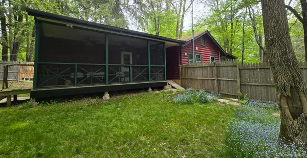 a view of backyard with green space