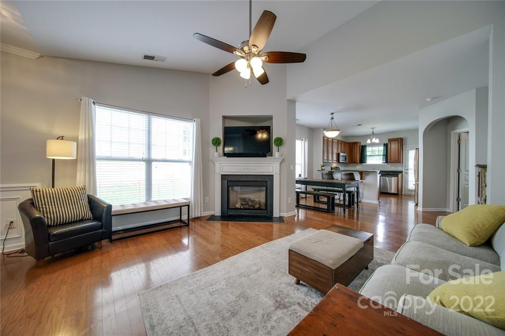 313 Sand Paver Way Fort Mill, SC 29708 - Photo 8 of 28 a living room with furniture fireplace and a flat screen tv