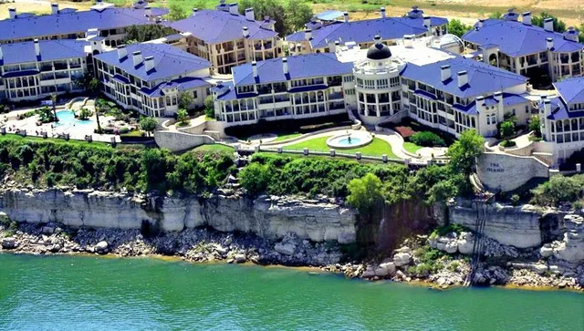 a aerial view of a house with a garden and plants