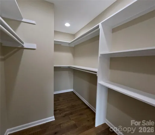 a hallway with wooden floor