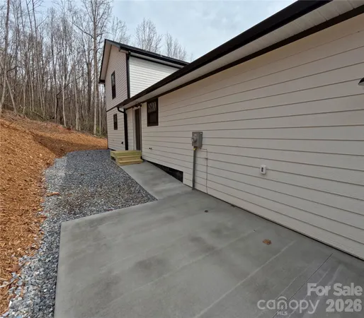 a view of backyard of house