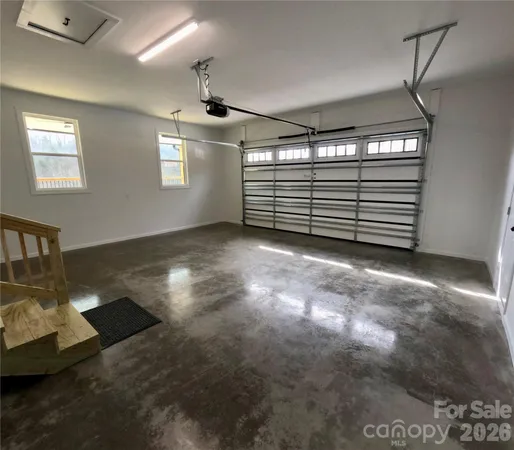 a view of empty room with windows