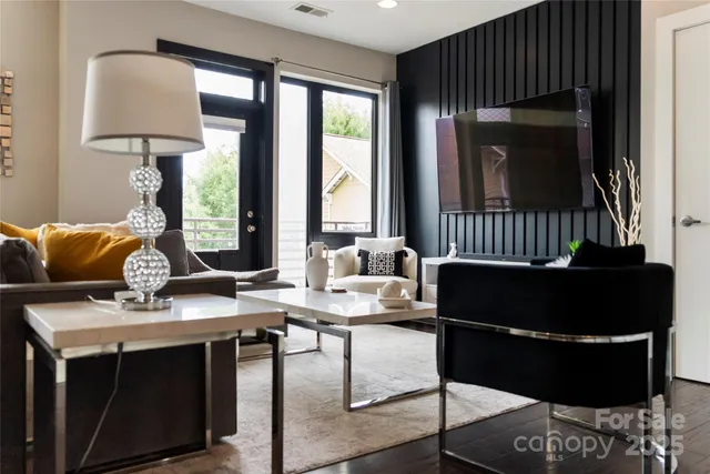 a living room with furniture and a window