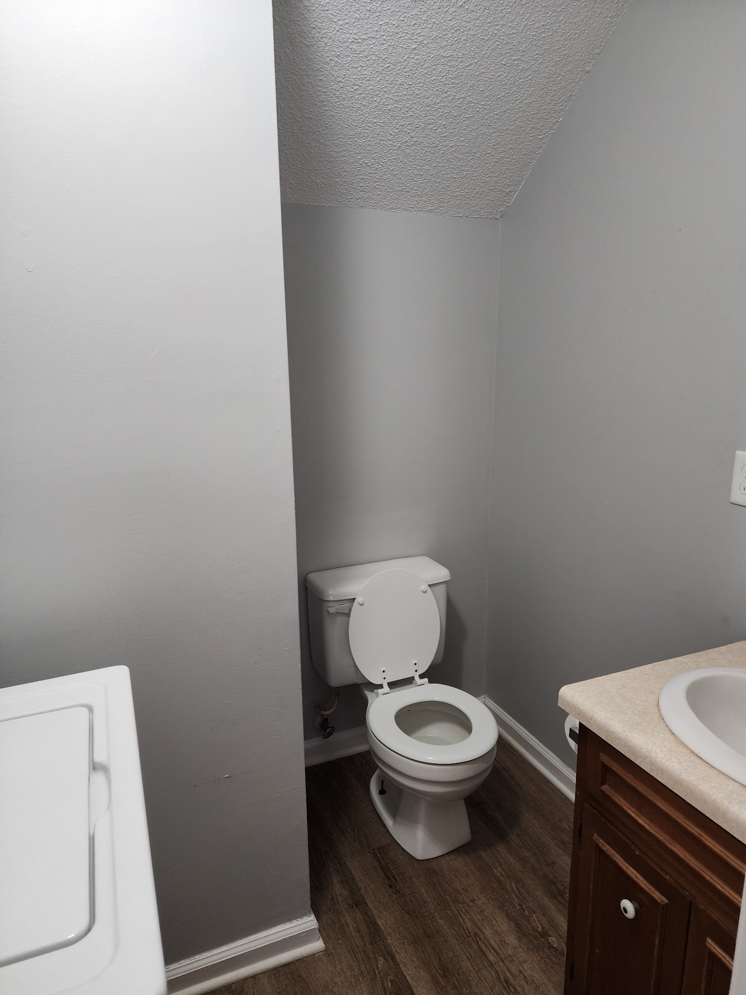 103 Helen Street Tullahoma, TN 37388 - Photo 6 of 10 a white toilet sitting next to a shower