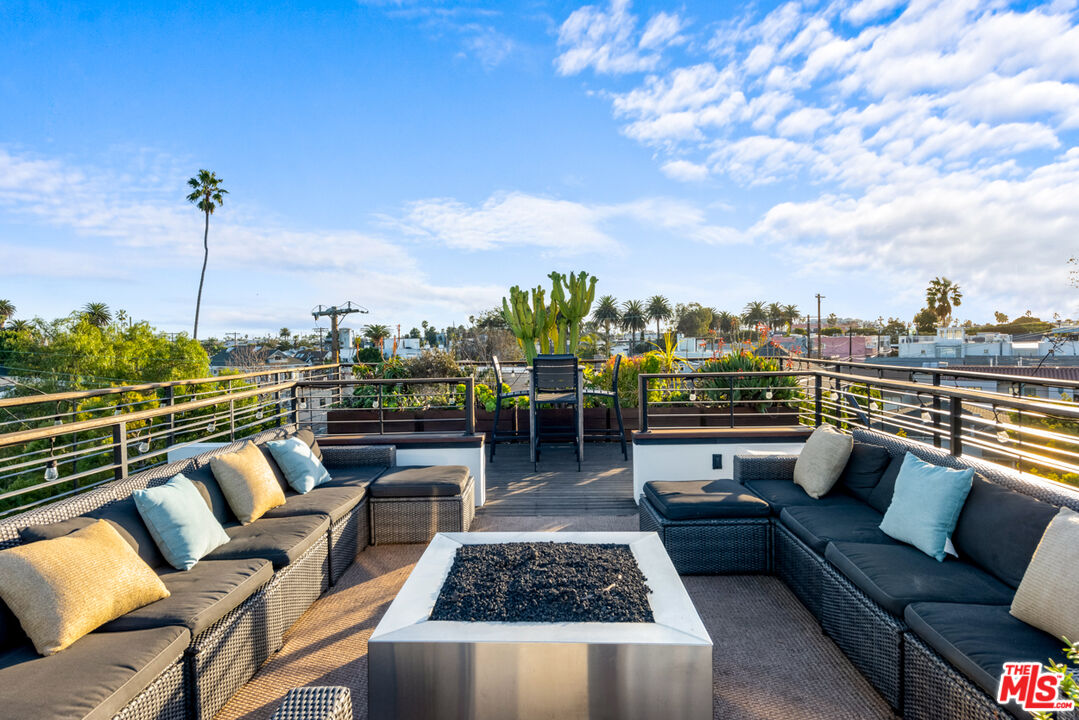 1220 Cabrillo Avenue Venice, CA 90291 - Photo 24 of 26 a balcony with furniture and city view