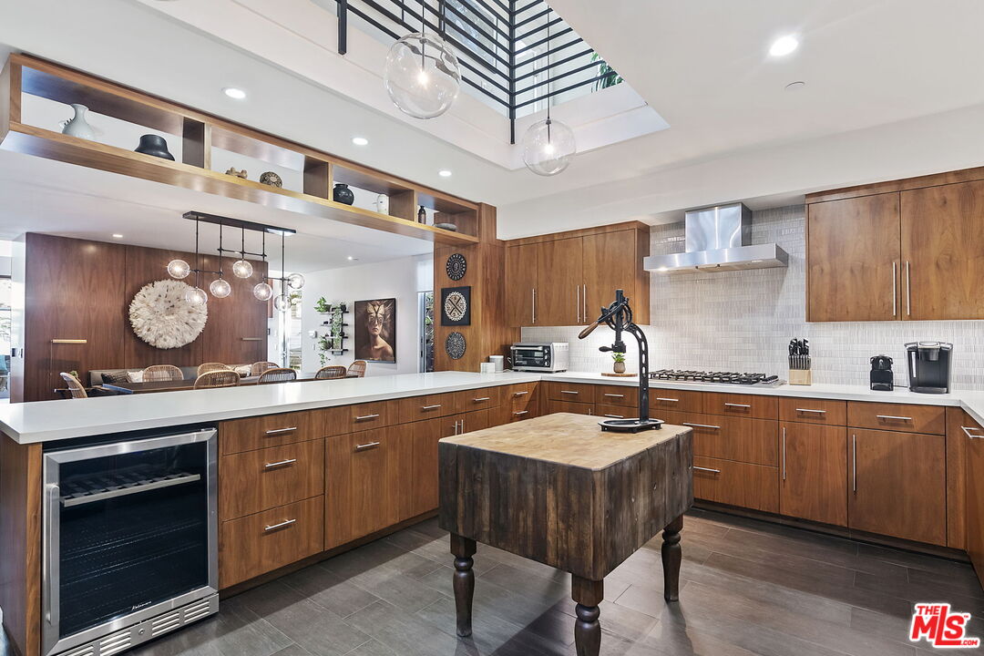 1220 Cabrillo Avenue Venice, CA 90291 - Photo 7 of 26 a kitchen with stainless steel appliances granite countertop a sink a stove and cabinets