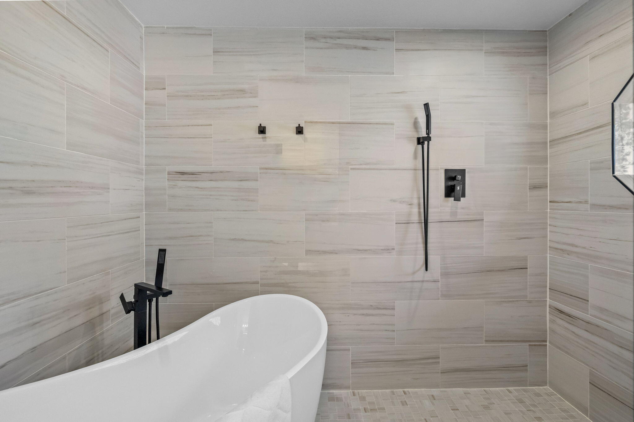 60340 Arnold Market Road Bend, OR 97702 - Photo 18 of 55 The wet room is a luxury experience, from the inviting soaking tub to the shower with nice views