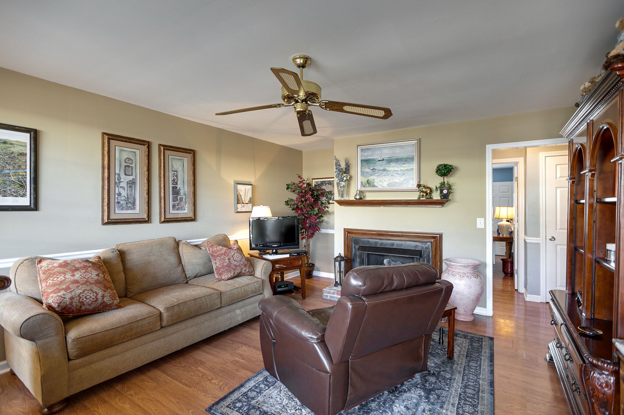 1011 General George Patton Road Nashville, TN 37221 - Photo 13 of 30 a living room with furniture and a fireplace