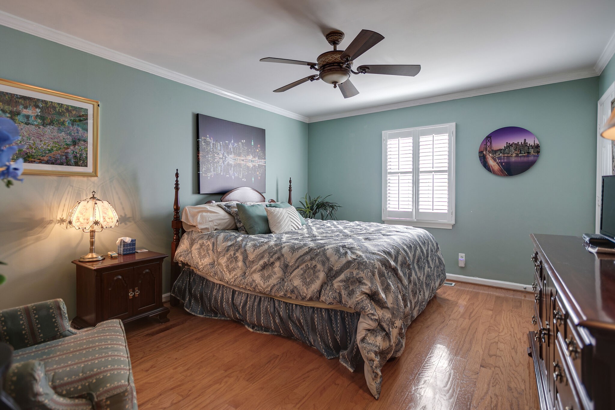 1011 General George Patton Road Nashville, TN 37221 - Photo 21 of 30 a bedroom with a bed and a chandelier