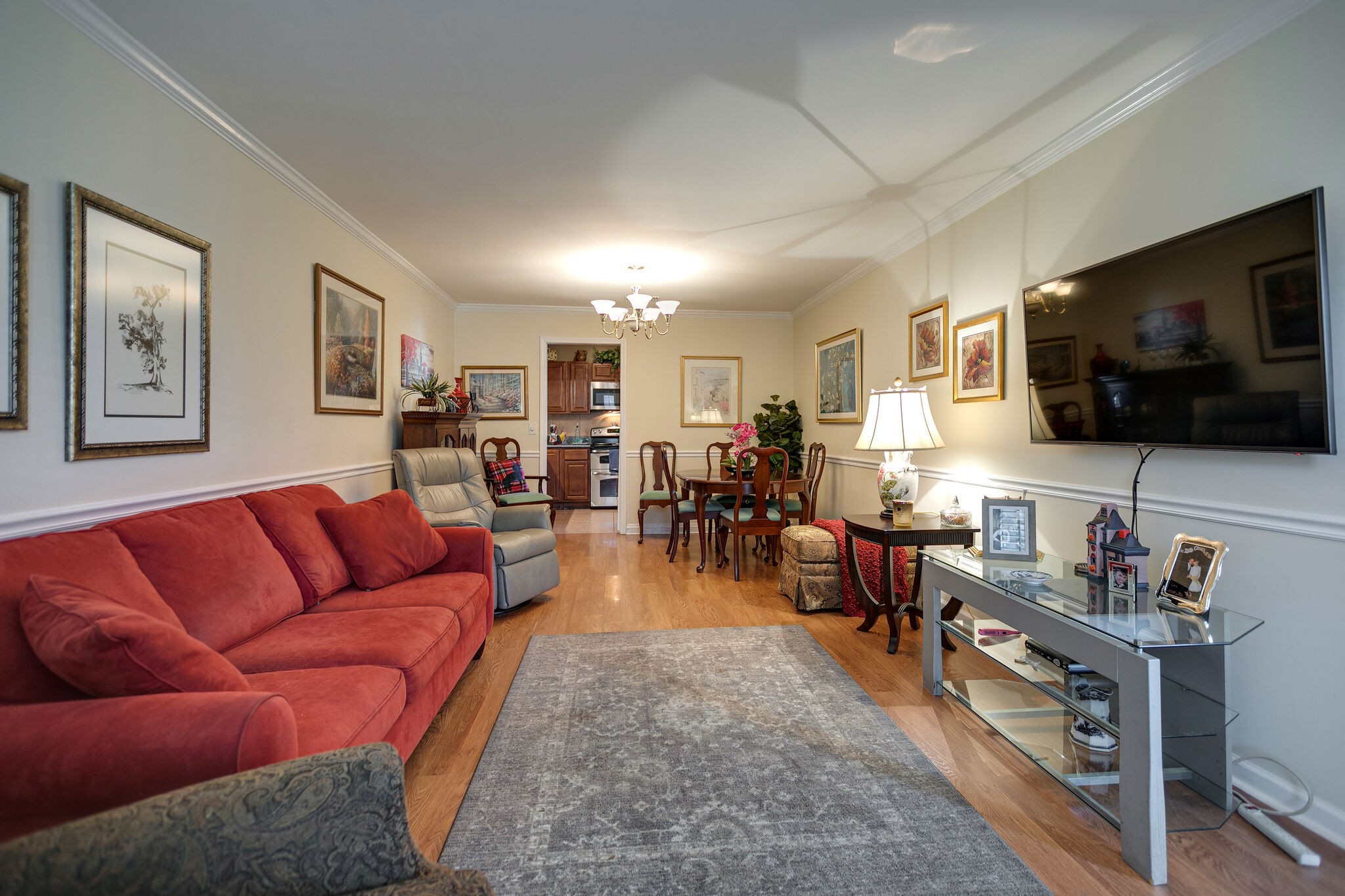 1011 General George Patton Road Nashville, TN 37221 - Photo 7 of 30 a living room with furniture and a flat screen tv