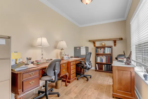 a bed room with a bed and a book shelf