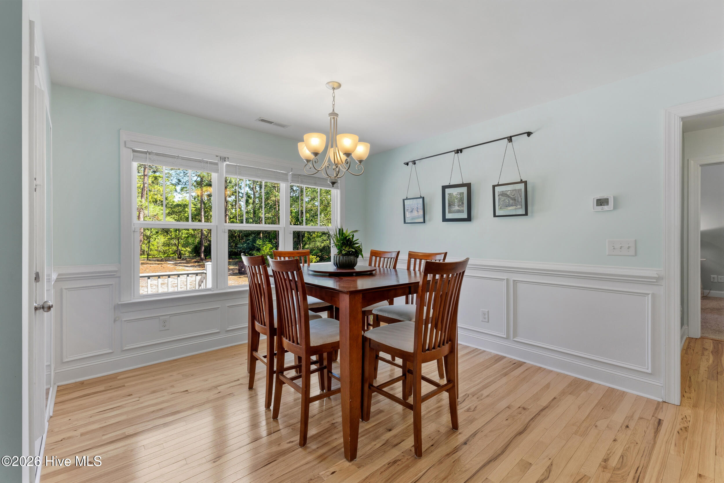 2030 Gastonia Road Southport, NC 28461 - Photo 17 of 89 Dining room with wainscotting