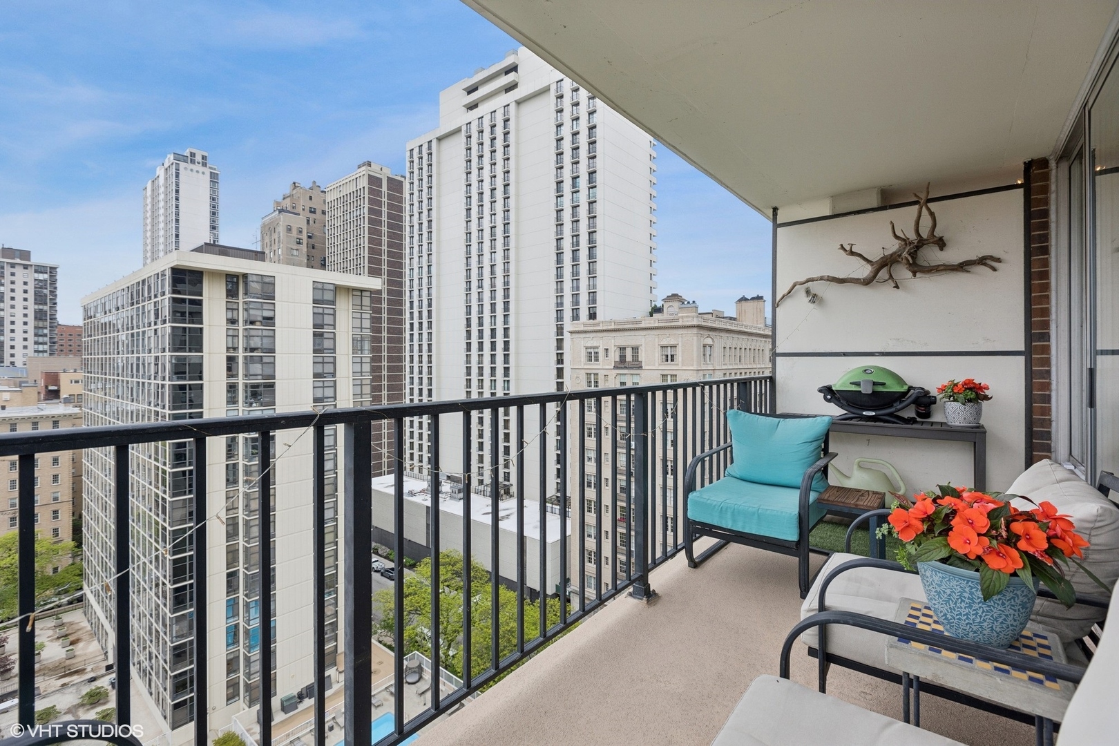 71 East Division Street, Unit 1606 Chicago, IL 60611 - Photo 11 of 34 a balcony view with couple of chairs