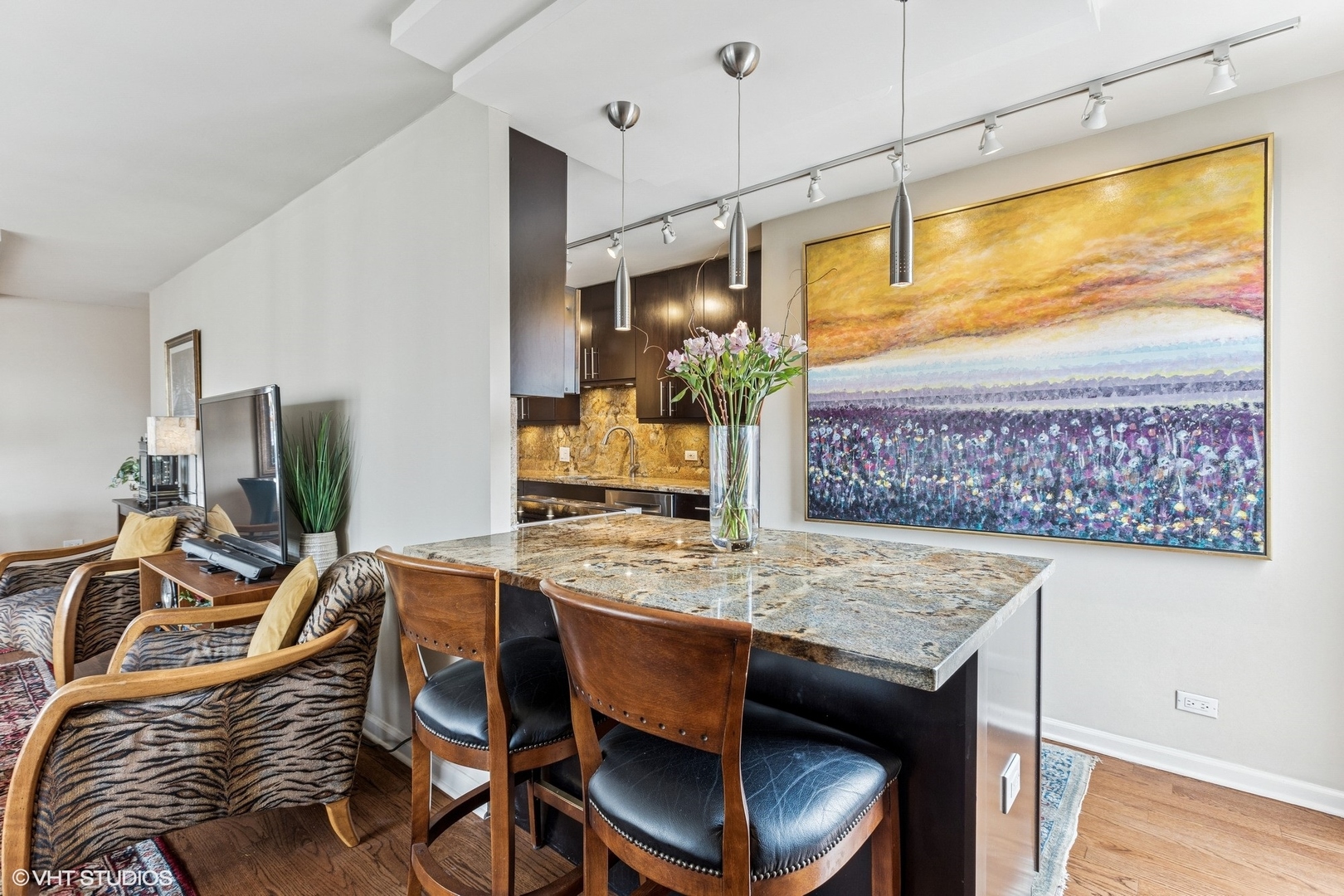 71 East Division Street, Unit 1606 Chicago, IL 60611 - Photo 13 of 34 a view of a dining room with furniture