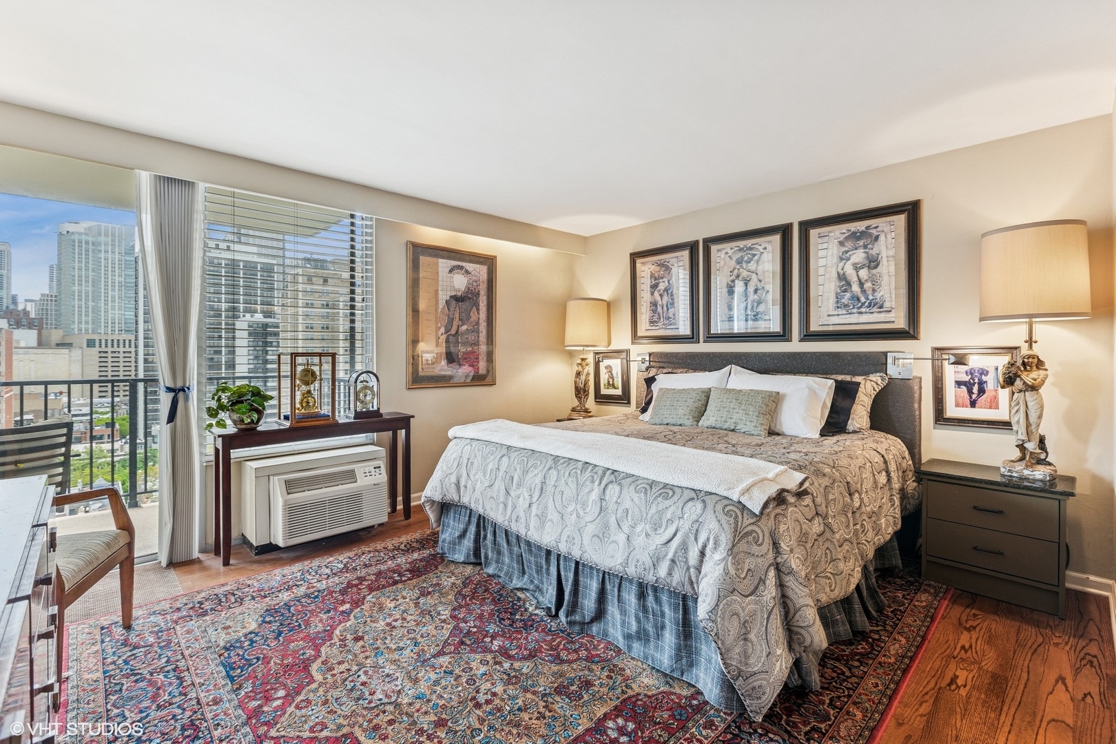 71 East Division Street, Unit 1606 Chicago, IL 60611 - Photo 18 of 34 a bedroom with a bed and a dresser next to a window