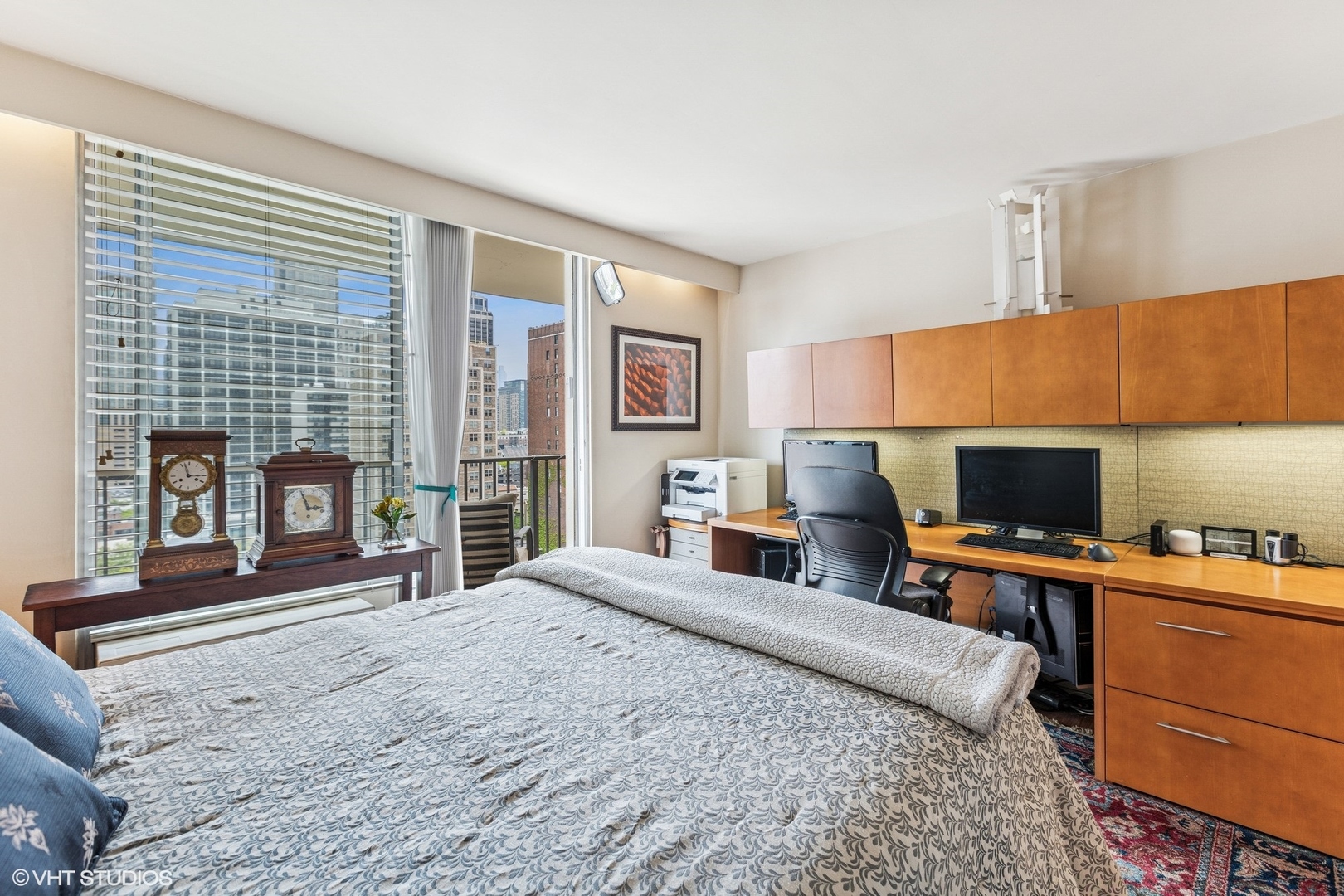 71 East Division Street, Unit 1606 Chicago, IL 60611 - Photo 20 of 34 a bed room with a bed and a television