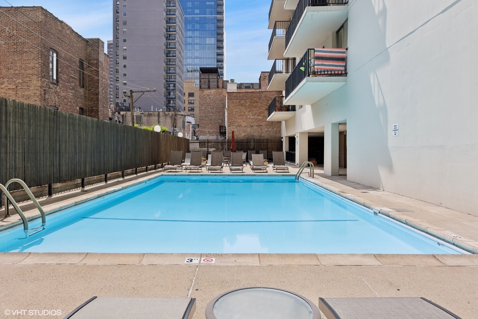 71 East Division Street, Unit 1606 Chicago, IL 60611 - Photo 27 of 34 a view of a balcony with chairs