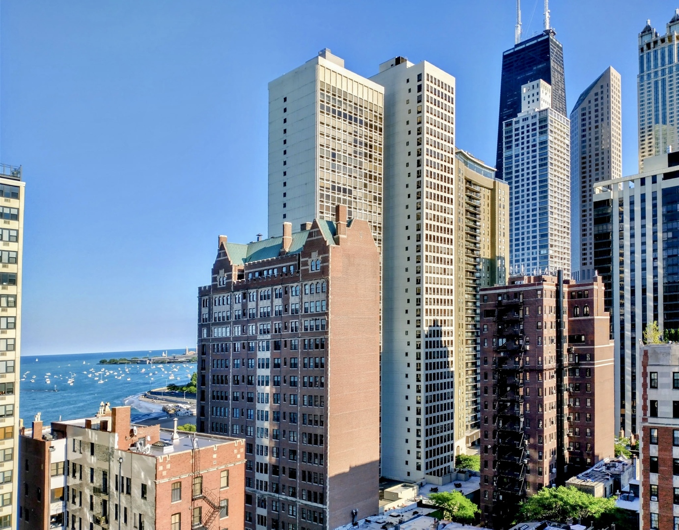 71 East Division Street, Unit 1606 Chicago, IL 60611 - Photo 34 of 34 a city skyline with tall buildings