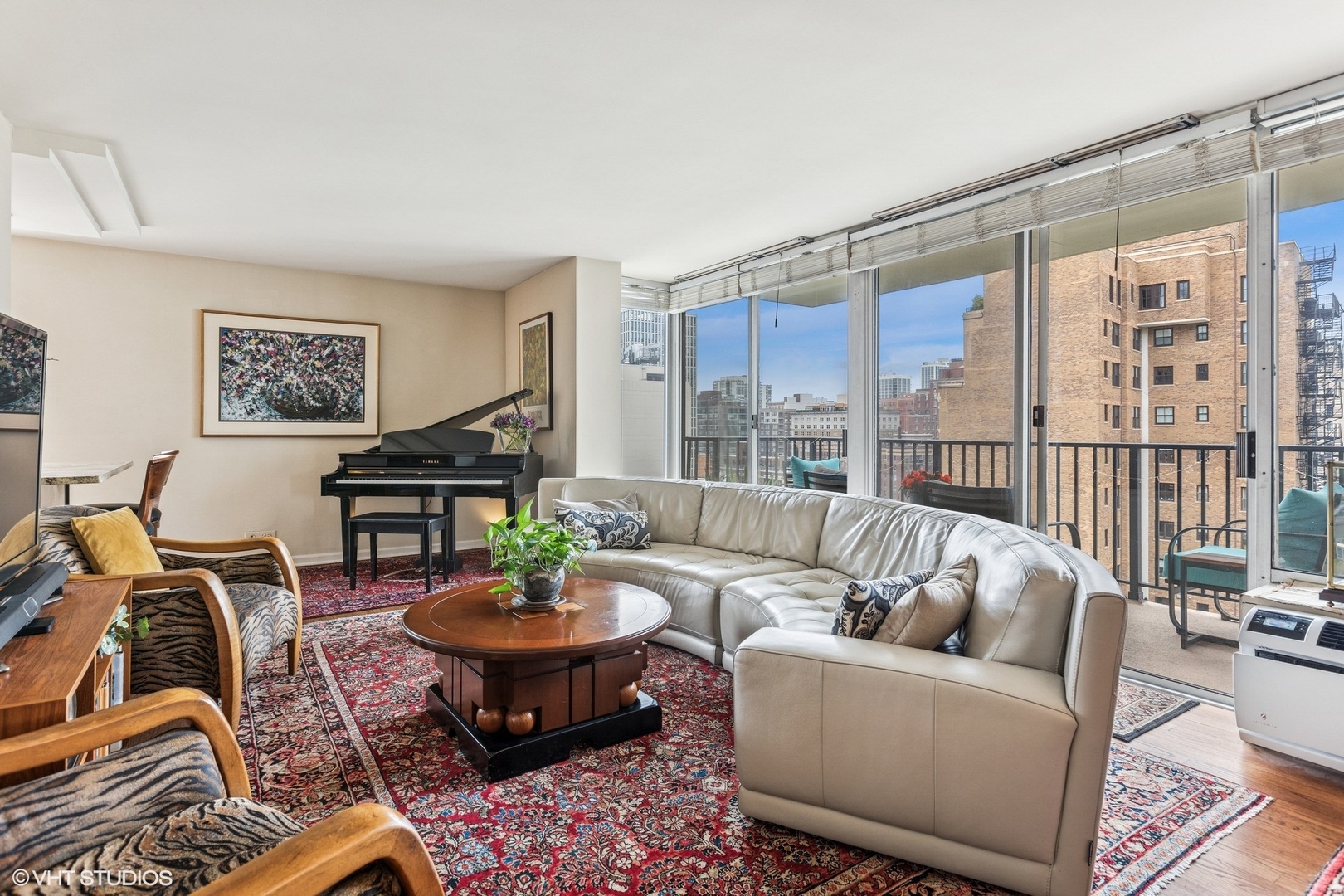 71 East Division Street, Unit 1606 Chicago, IL 60611 - Photo 5 of 34 a living room with furniture and a large window