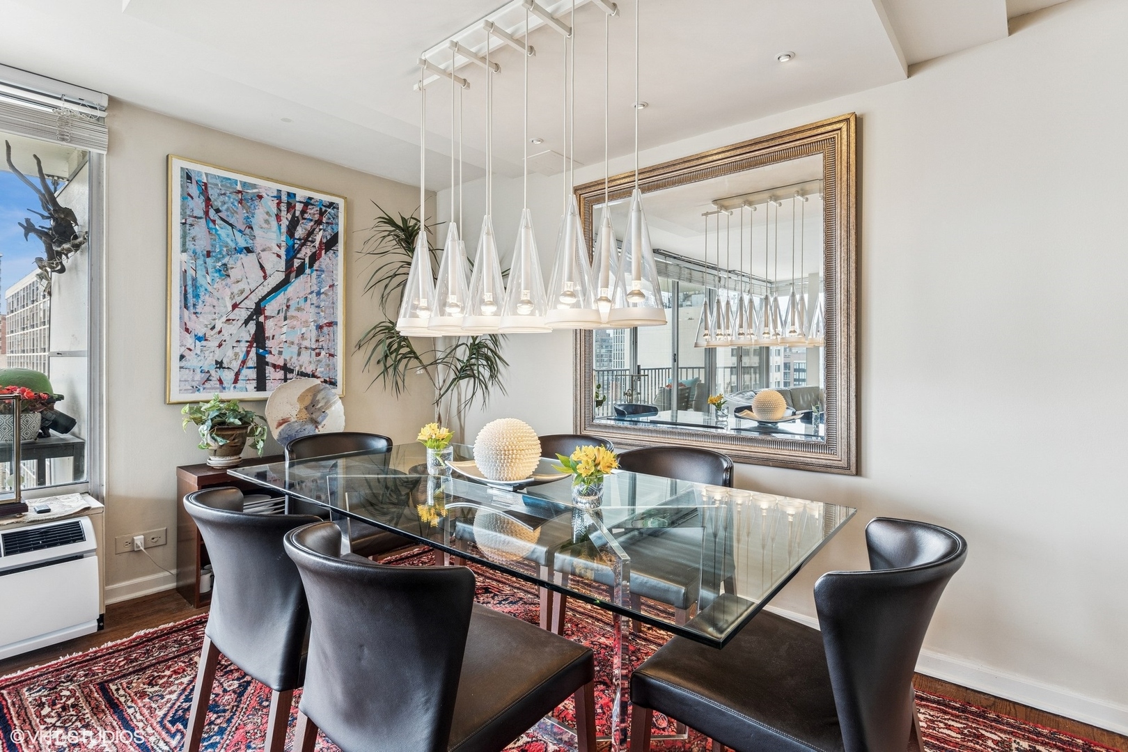 71 East Division Street, Unit 1606 Chicago, IL 60611 - Photo 7 of 34 a dining room with furniture and window