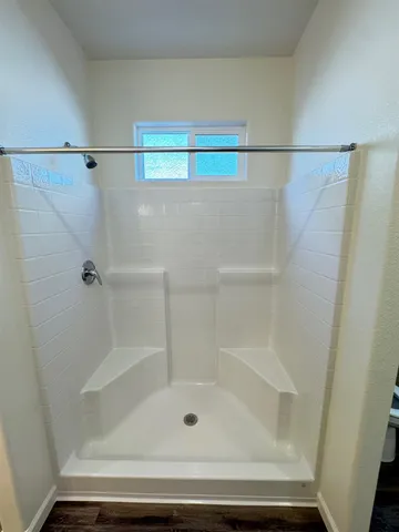 a view of an empty walk in closet