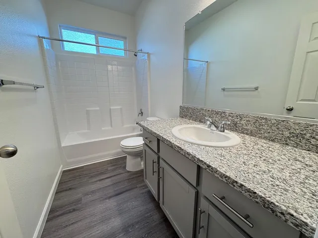 an empty room with closet area