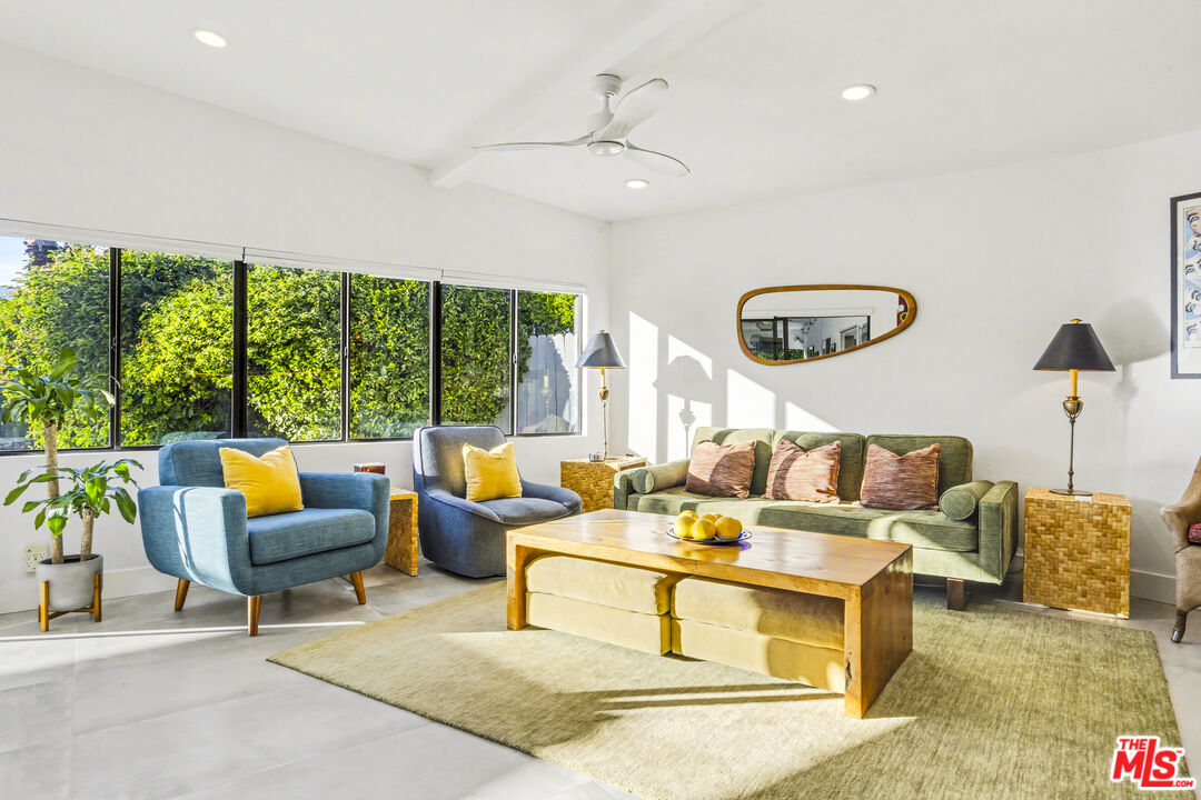 37223 Ferber Drive Rancho Mirage, CA 92270 - Photo 11 of 48 a living room with furniture and a large window