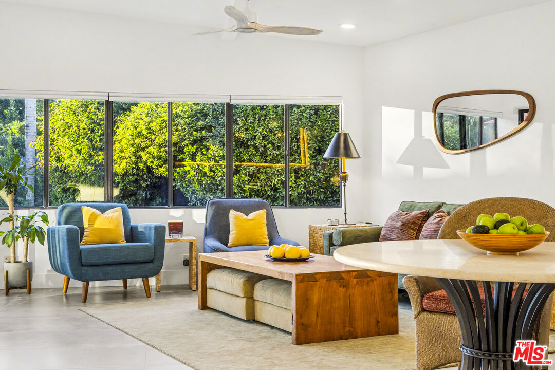37223 Ferber Drive Rancho Mirage, CA 92270 - Photo 13 of 48 a living room with furniture and a large window