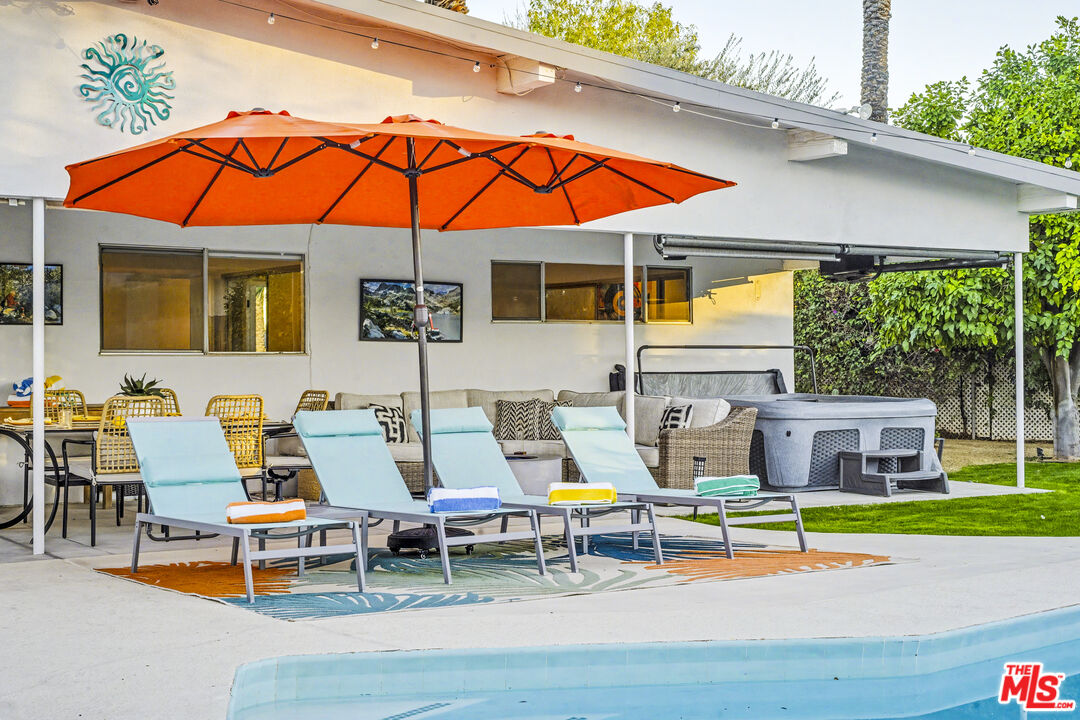 37223 Ferber Drive Rancho Mirage, CA 92270 - Photo 35 of 48 a backyard of a house with seating space