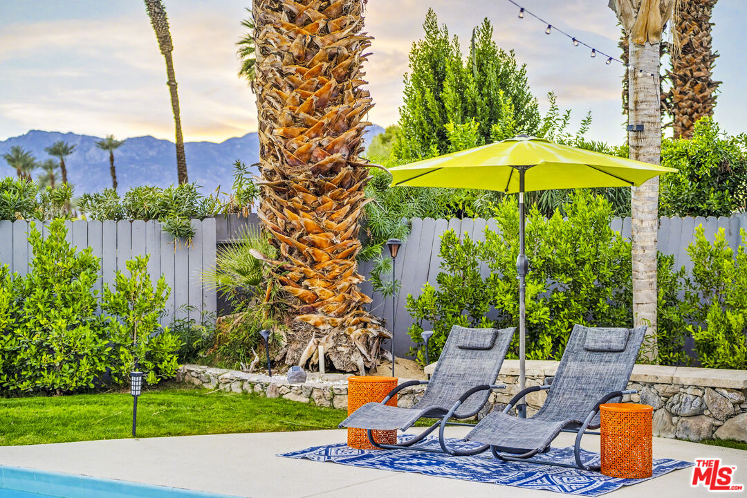 37223 Ferber Drive Rancho Mirage, CA 92270 - Photo 37 of 48 a view of a backyard with a patio table and chairs